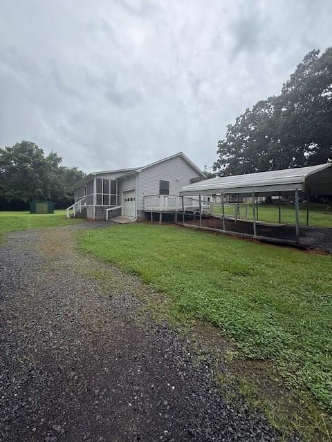 100 Walter Leon Dr, Chatsworth, GA 30705 - back of house with a yard and a garage