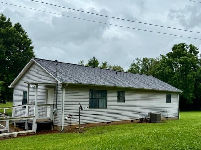 100 Walter Leon Dr, Chatsworth, GA 30705 - rear view of house with crawl space, a shingled roof, and a lawn