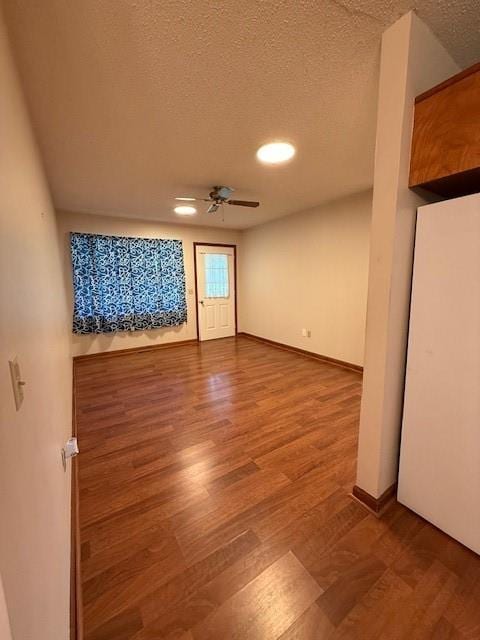 100 Walter Leon Dr, Chatsworth, GA 30705 - spare room with a textured ceiling, wood finished floors, and a ceiling fan