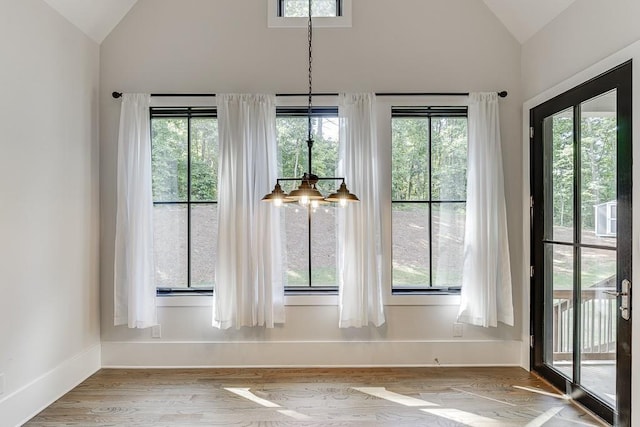 room details featuring wood finished floors and baseboards