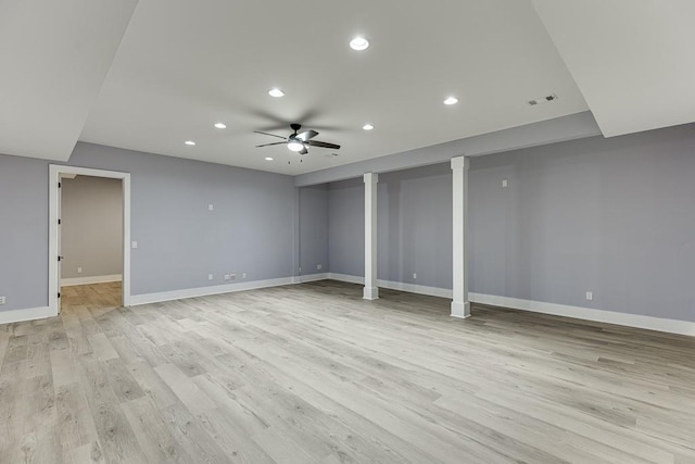 empty room with recessed lighting, visible vents, a ceiling fan, light wood-type flooring, and baseboards