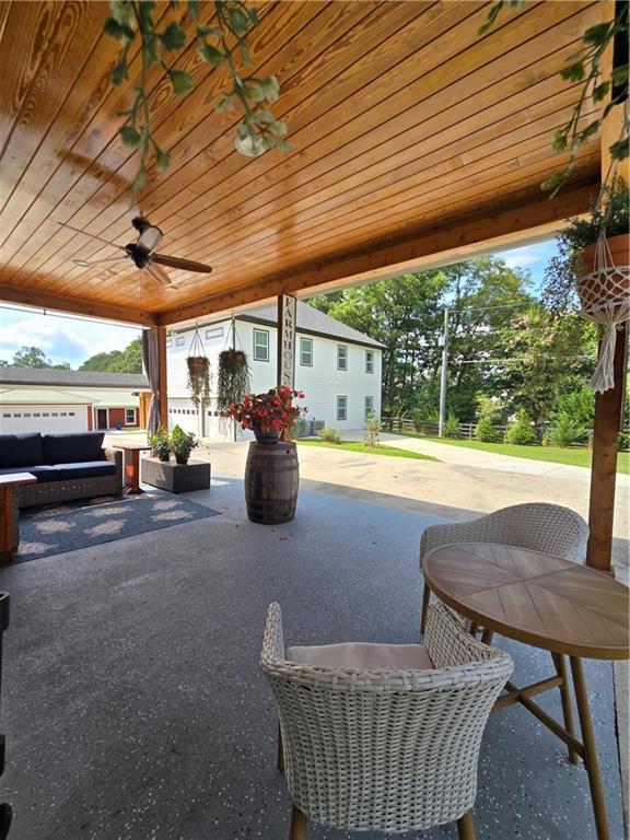 view of patio / terrace with ceiling fan