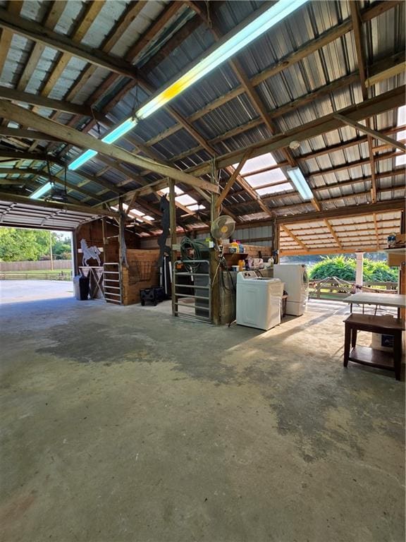 view of horse barn with independent washer and dryer