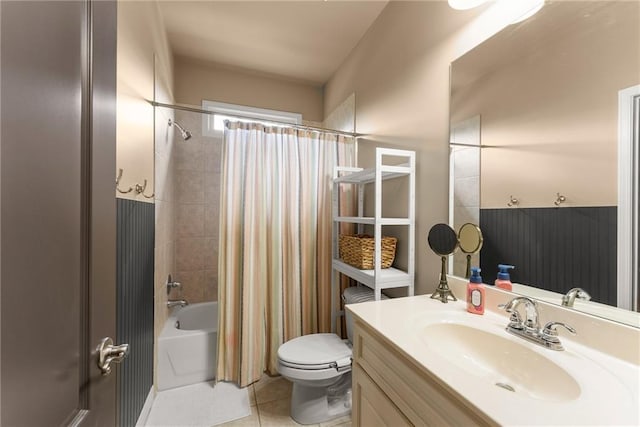 full bathroom with toilet, tile patterned floors, shower / bath combo, and vanity