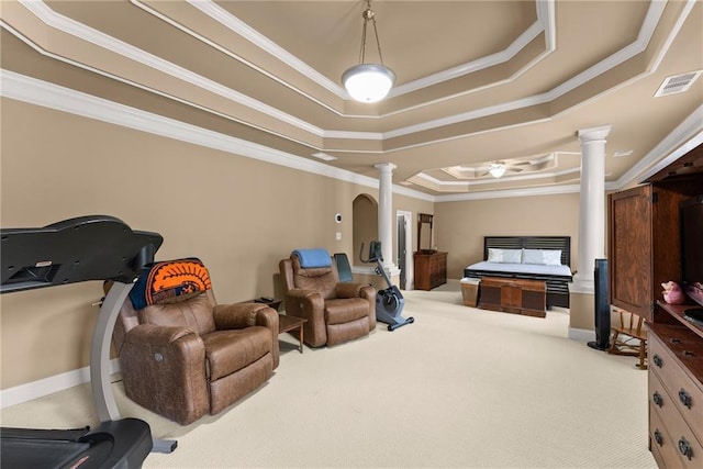 carpeted bedroom featuring crown molding, visible vents, decorative columns, and a raised ceiling