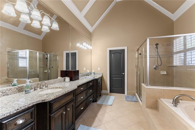 full bath with double vanity, a sink, a bath, and a shower stall