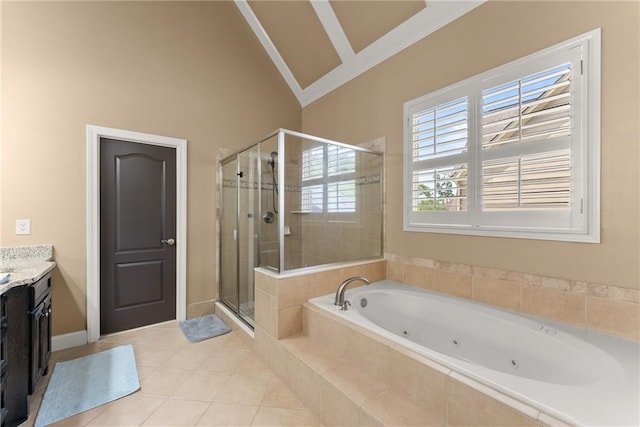 full bathroom with vanity, tile patterned floors, a whirlpool tub, lofted ceiling, and a stall shower