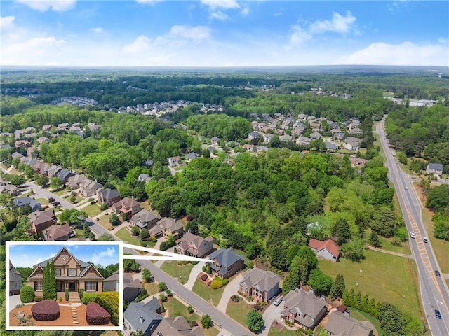 drone / aerial view with a residential view