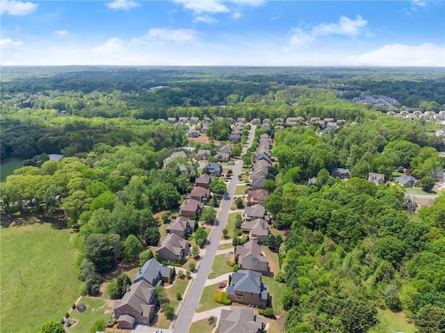 bird's eye view with a view of trees and a residential view