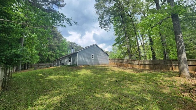 view of yard featuring a fenced backyard