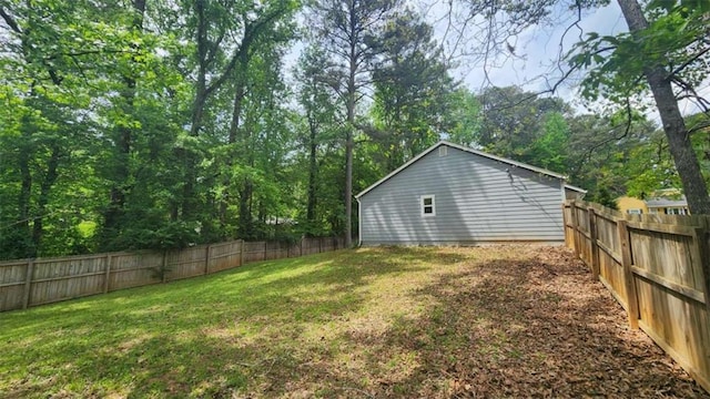 view of yard with a fenced backyard