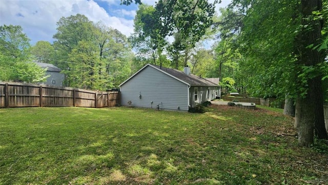 view of yard featuring a fenced backyard