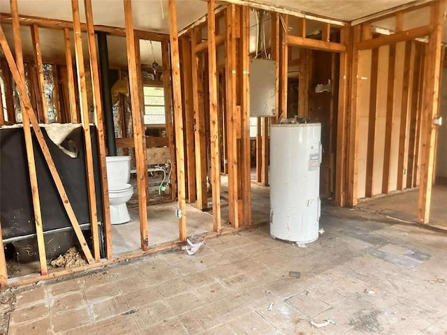 miscellaneous room featuring electric water heater