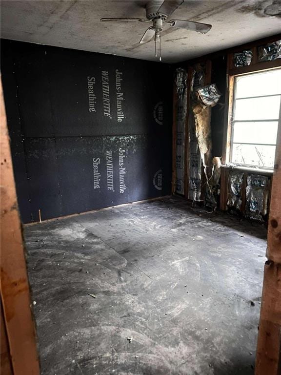 unfurnished room featuring ceiling fan