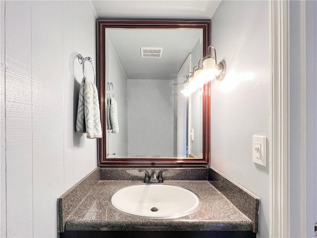 bathroom featuring visible vents and vanity