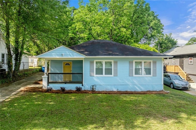 1396 Elizabeth Ln, Atlanta, GA 30344 - view of front of property featuring covered porch and a front lawn