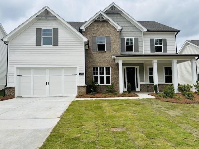 3355 Hillshire Dr, Cumming, GA 30028 - craftsman-style home featuring brick siding, concrete driveway, a front lawn, an attached garage, and a porch