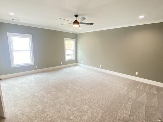 3355 Hillshire Dr, Cumming, GA 30028 - spare room with ornamental molding, baseboards, ceiling fan, light carpet, and recessed lighting