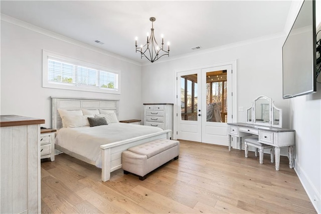 bedroom featuring crown molding, french doors, visible vents, and light wood-style floors