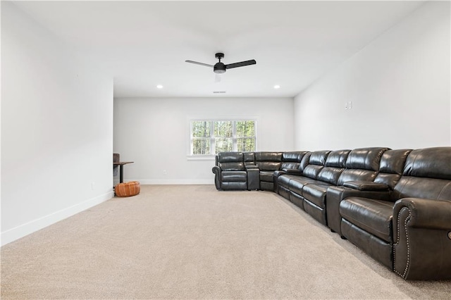 living room featuring recessed lighting, baseboards, ceiling fan, and light colored carpet