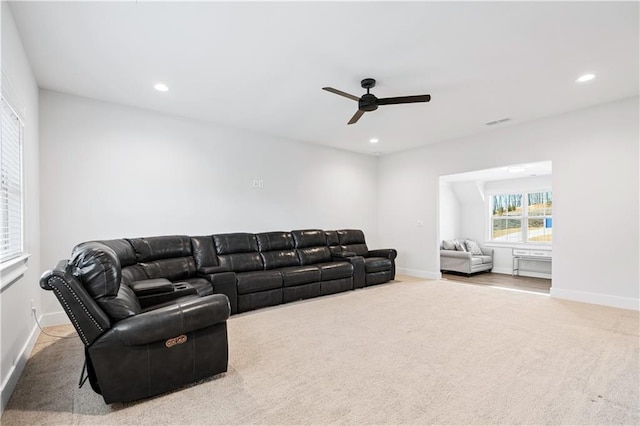 living area with carpet floors, recessed lighting, and baseboards