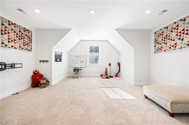 playroom with lofted ceiling, carpet flooring, visible vents, and baseboards