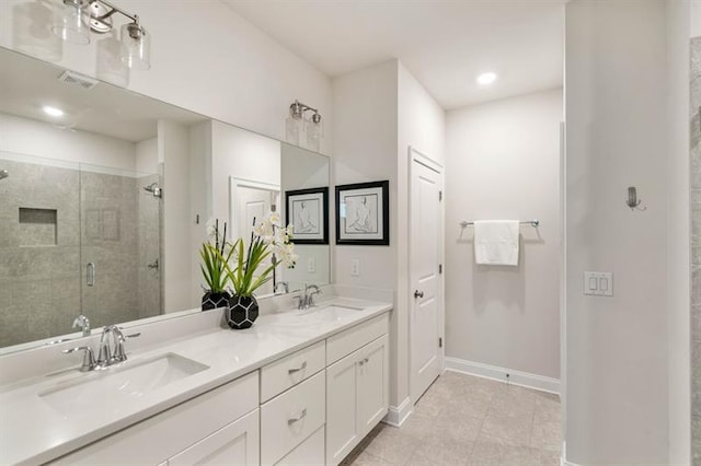 bathroom featuring vanity, walk in shower, and tile patterned floors