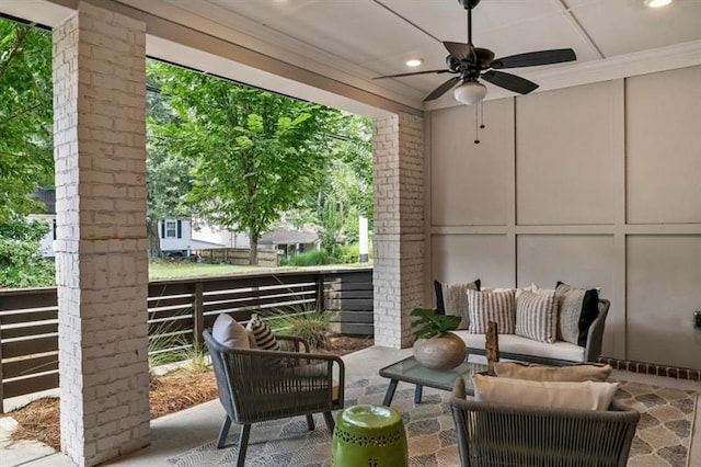 view of patio / terrace featuring ceiling fan, an outdoor hangout area, and a balcony