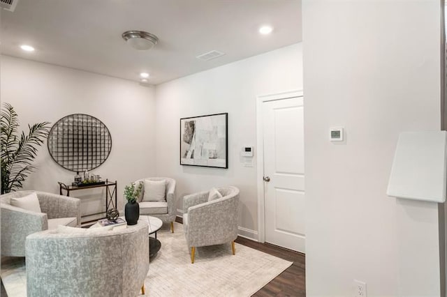 living area featuring hardwood / wood-style floors