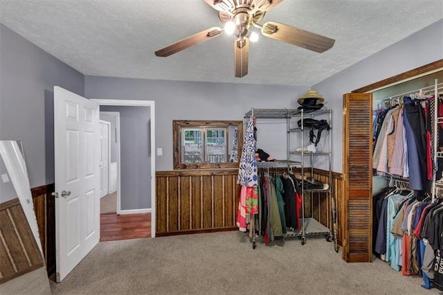 586 Old Bushmill Rd, Bremen, GA 30110 - bedroom featuring a textured ceiling, carpet floors, a closet, and a ceiling fan