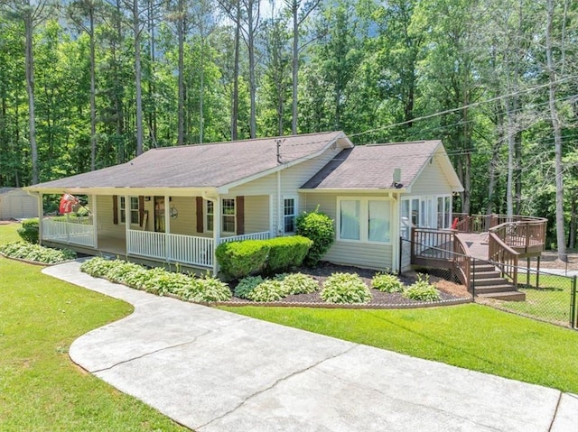 586 Old Bushmill Rd, Bremen, GA 30110 - single story home with a porch, a front lawn, roof with shingles, and a wooden deck