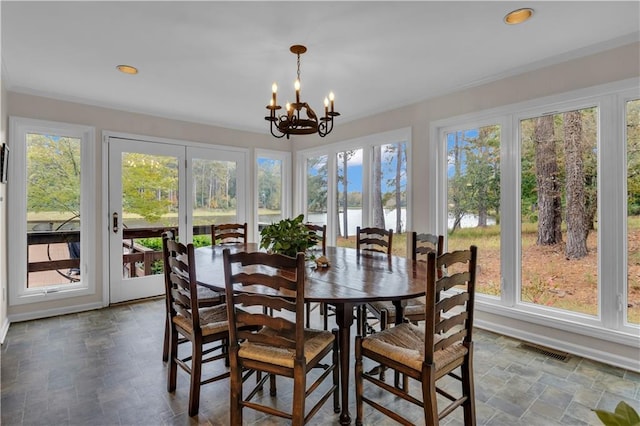 dining space featuring a chandelier