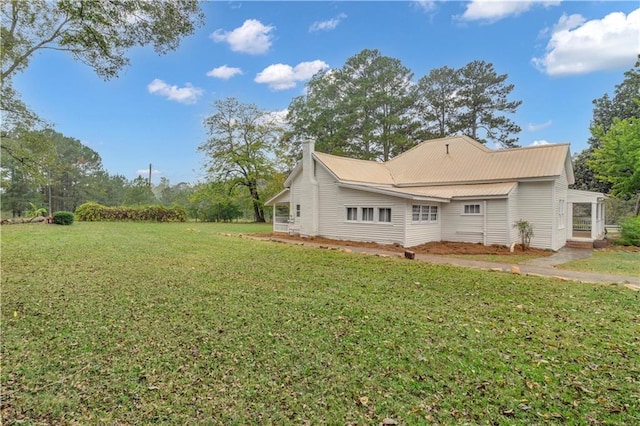 exterior space with a yard