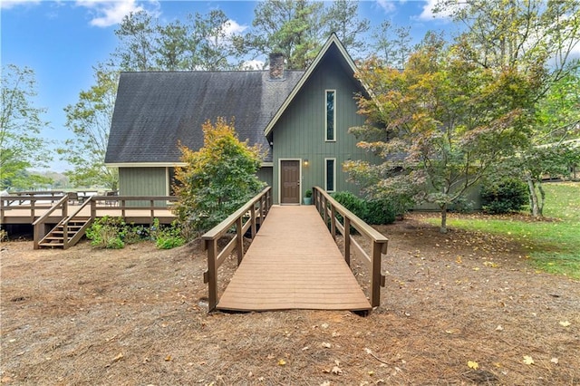 rear view of property with a deck