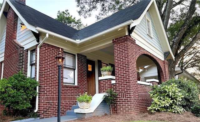 1670 Rogers Ave SW, Atlanta, GA 30310 - exterior space with brick siding and a shingled roof
