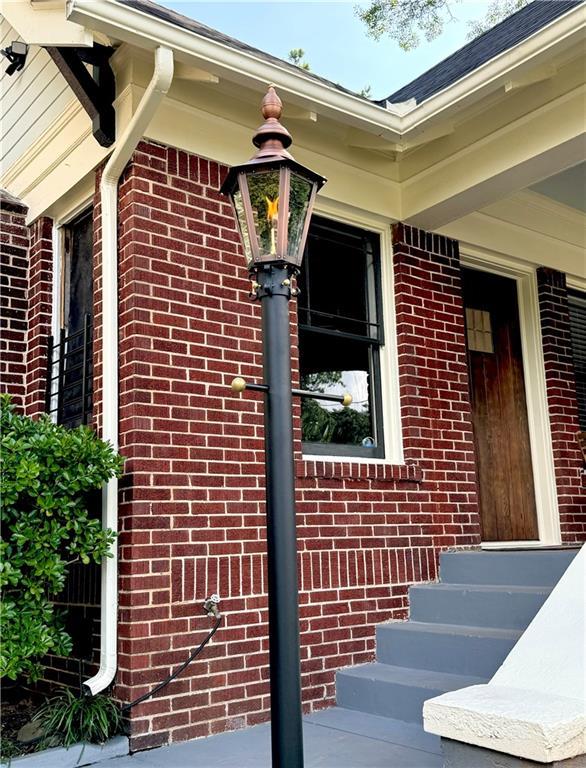 1670 Rogers Ave SW, Atlanta, GA 30310 - doorway to property featuring brick siding