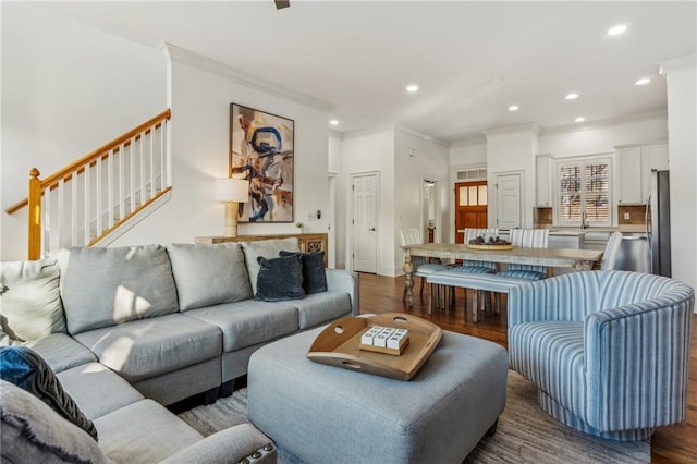 living room featuring sink, dark hardwood / wood-style floors, ceiling fan, and french doors