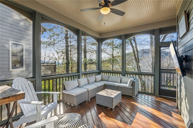 sunroom / solarium with ceiling fan