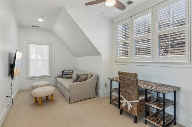 office with ceiling fan, crown molding, and light carpet