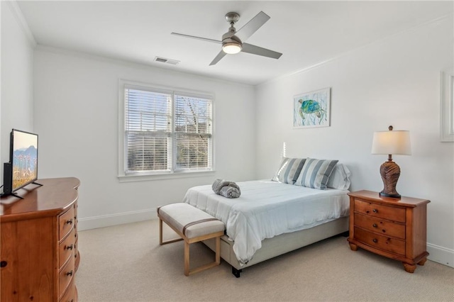 bedroom featuring ceiling fan and light colored carpet