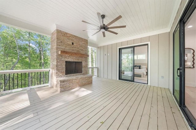 5990 Watermark Cv, Gainesville, GA 30506 - deck with an outdoor stone fireplace and a ceiling fan