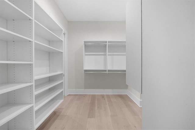 5990 Watermark Cv, Gainesville, GA 30506 - spacious closet with wood finished floors