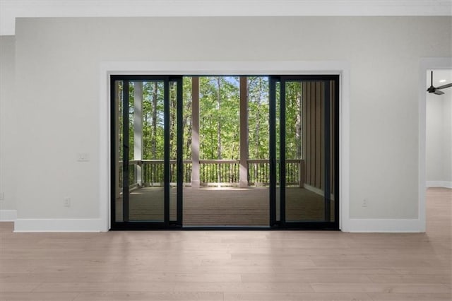 5990 Watermark Cv, Gainesville, GA 30506 - doorway to outside with baseboards and wood finished floors