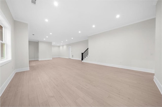 5990 Watermark Cv, Gainesville, GA 30506 - below grade area featuring stairway, light wood finished floors, baseboards, and recessed lighting