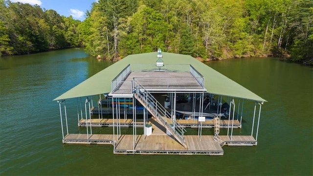5990 Watermark Cv, Gainesville, GA 30506 - dock area featuring boat lift, a view of trees, and a water view