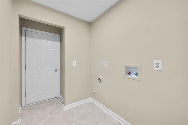 laundry area with electric dryer hookup, gas dryer hookup, and washer hookup