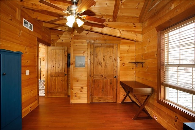 1225 Pitts Chapel, Newborn, GA 30056 - interior space with wooden walls, beamed ceiling, ceiling fan, and wood finished floors