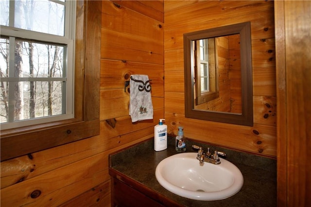 1225 Pitts Chapel, Newborn, GA 30056 - bathroom with wooden walls, healthy amount of natural light, and vanity