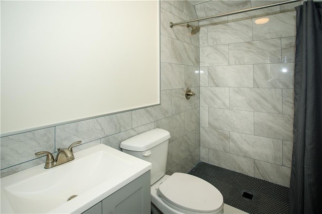 1225 Pitts Chapel, Newborn, GA 30056 - full bath featuring a tile shower, toilet, vanity, and tile walls