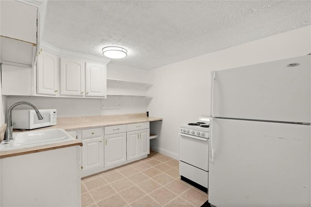 kitchen with open shelves, a sink, white appliances, white cabinets, and light countertops